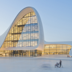 3D Parametric Design of futuristic fluid architecture with glass facade