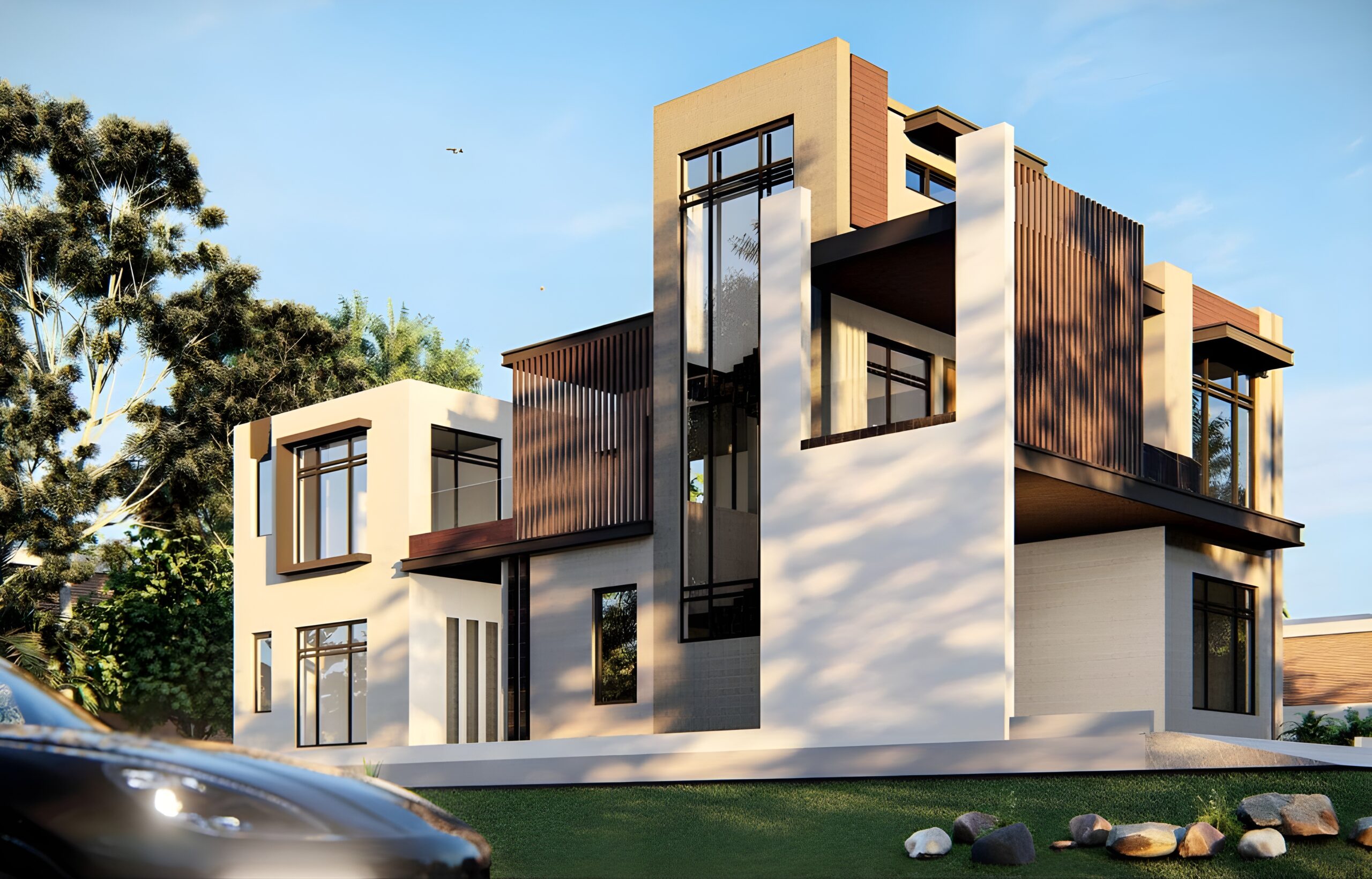 Modern residential architecture featuring a multi-story cubist design with vertical wooden slats, expansive glass windows, and a neutral stucco finish.